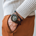 The CHRONUS Cosmic Night Khaki features a classic SEIKO VD54 chronograph movement, scratch resistant sapphire coated glass and stainless steel enforced strap links. The watch is made of black sandalwood and has a black dial with golden details. Handcrafte
