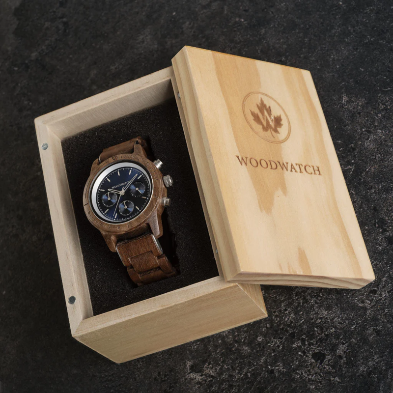 The CHRONUS Collection features a classic SEIKO VD54 chronograph movement, scratch resistant sapphire coated glass and stainless steel enforced strap links. The CHRONUS Sapphire Silver is made of American walnut wood and has a blue dial with silver detail